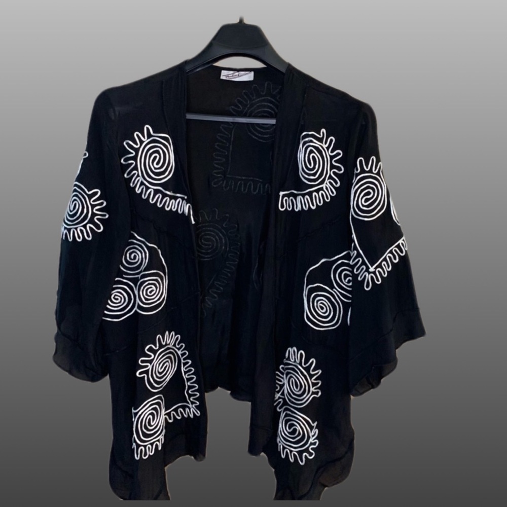 SterlingStyles  Black open front overblouse with white piping design